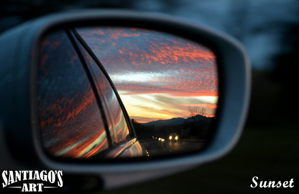Sunset in rear view mirror photography by artist H. Santiago