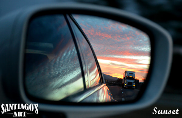 Sunset in rear view mirror photography by artist H. Santiago